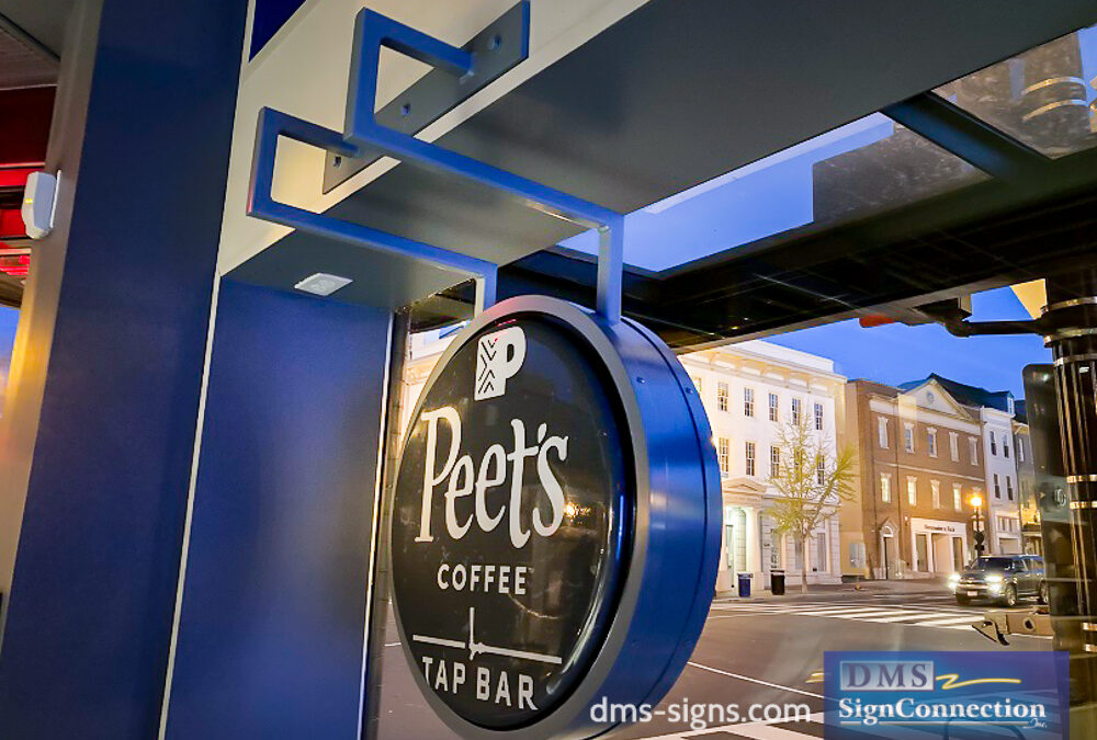 Window Sign For Peet’s Coffee In Georgetown DC Installed With a Custom Bracket